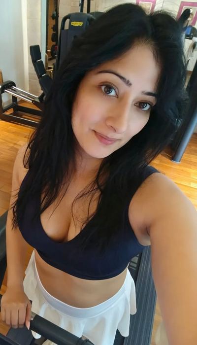 Niharica Raizada In A White Flared Tennis Skirt.