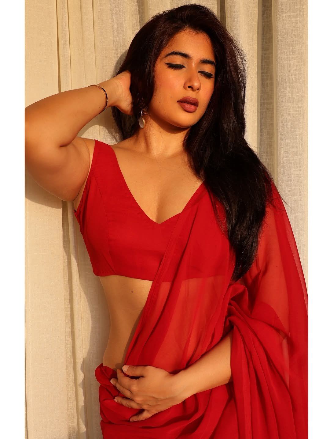 Nikita Sharma With Intense Gaze And Smoky Eyes