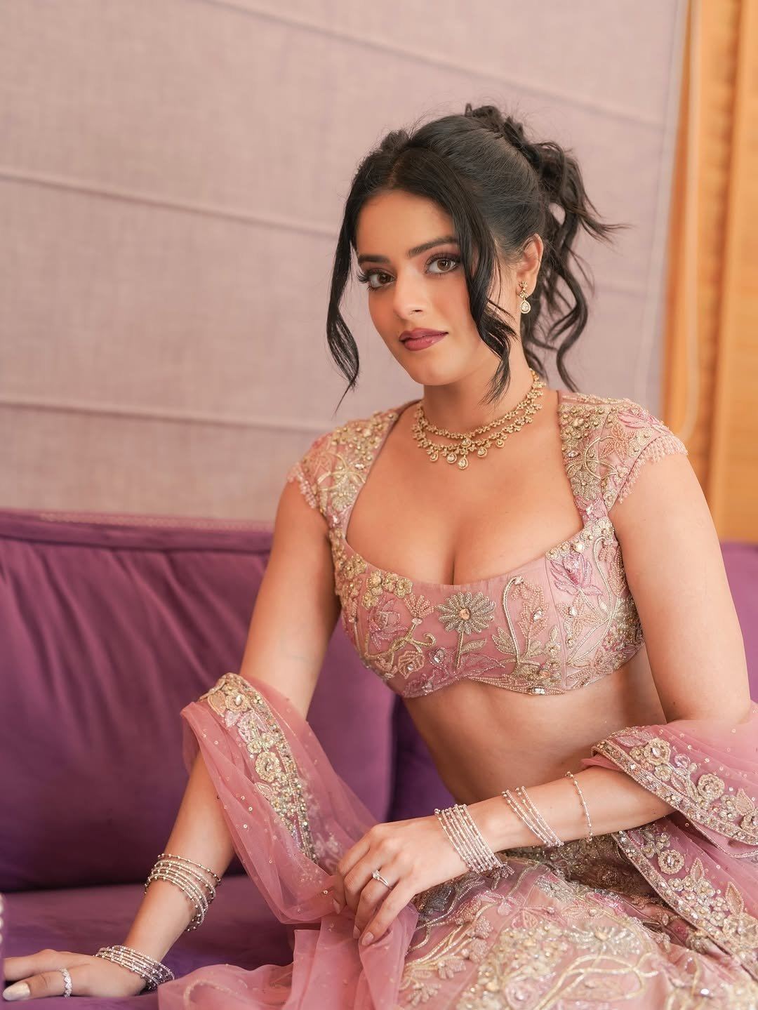 Riddhi Kumar Royal Pink Lehenga Sitting Pose Shot