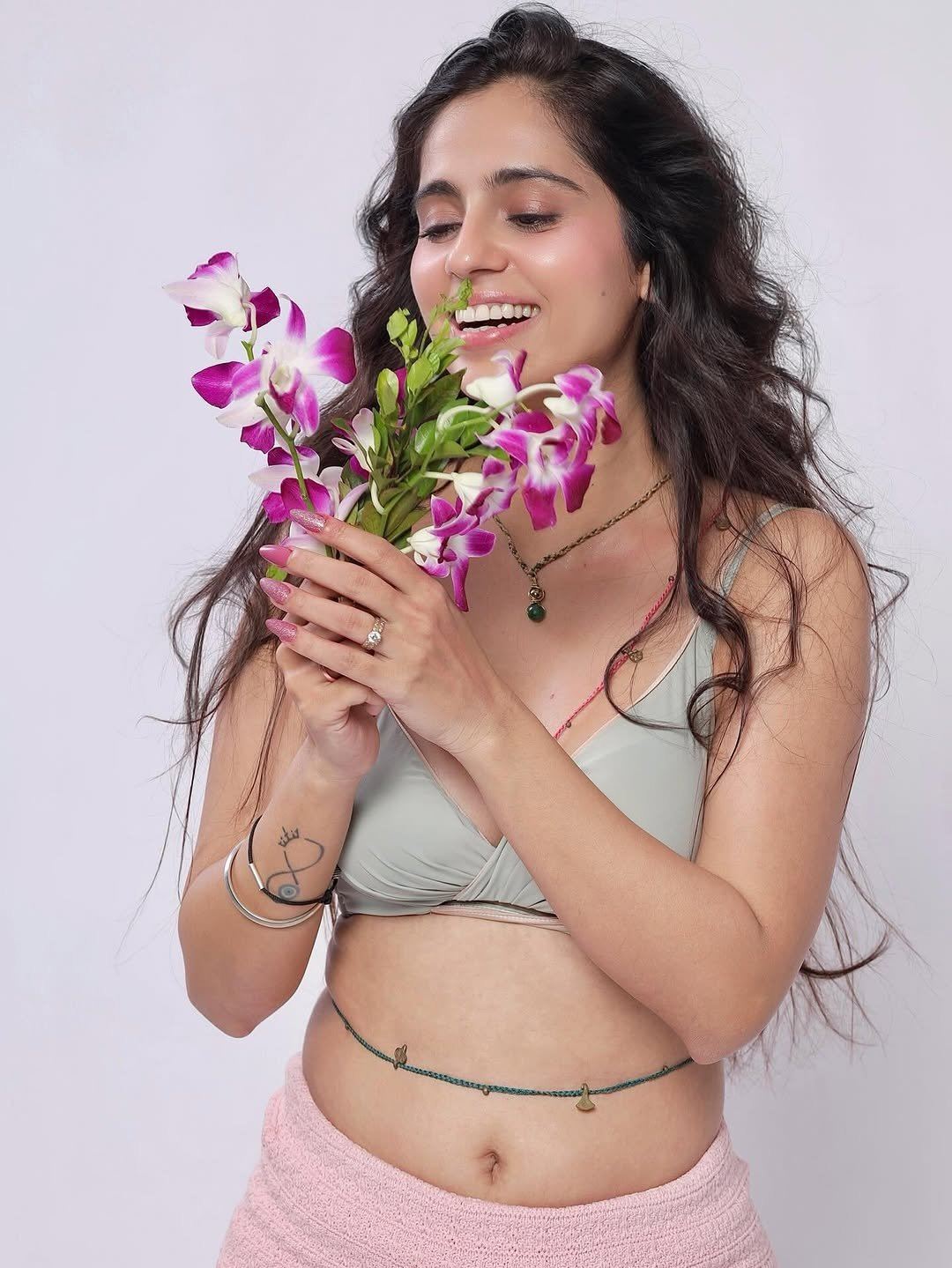 Rose Sardana Poses In Sage Green Bralette Look
