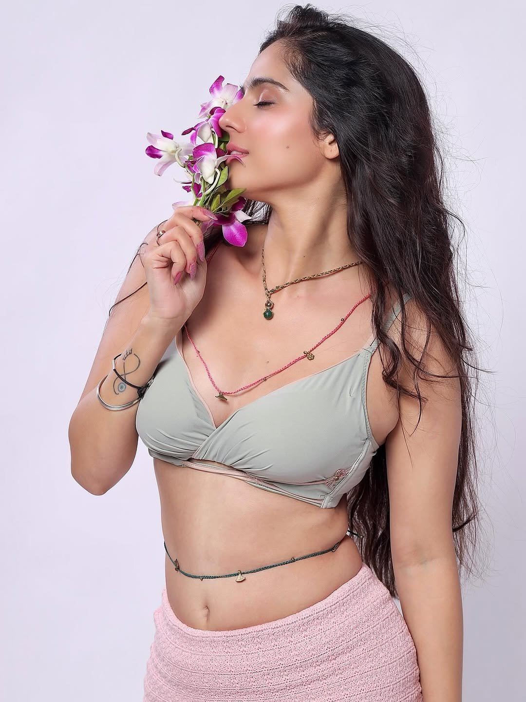 Rose Sardana Playful Expression With Finger On Lip