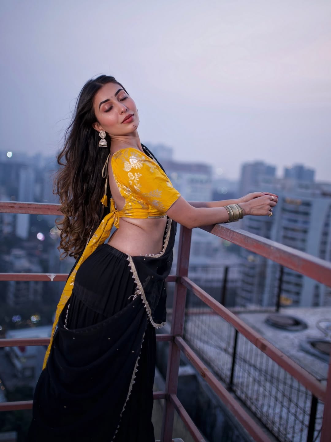 Ruma Sharma In A Bold Black Saree Rooftop Style.