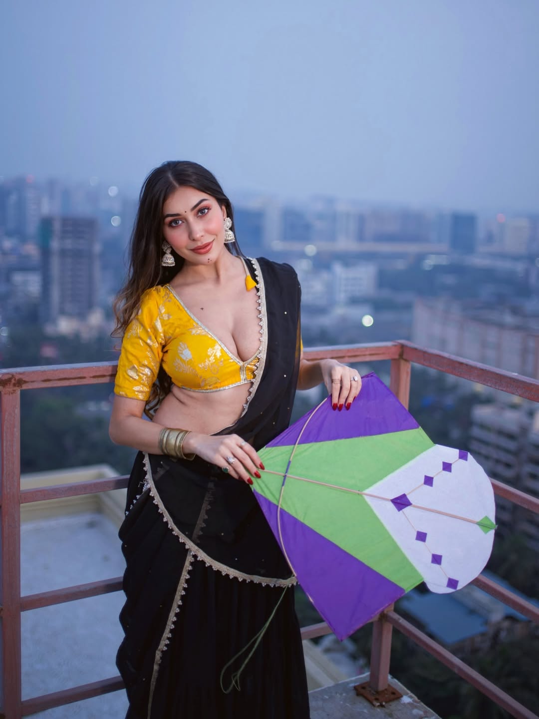 Stunning Ruma Sharma Holds A Bright Colorful Kite.