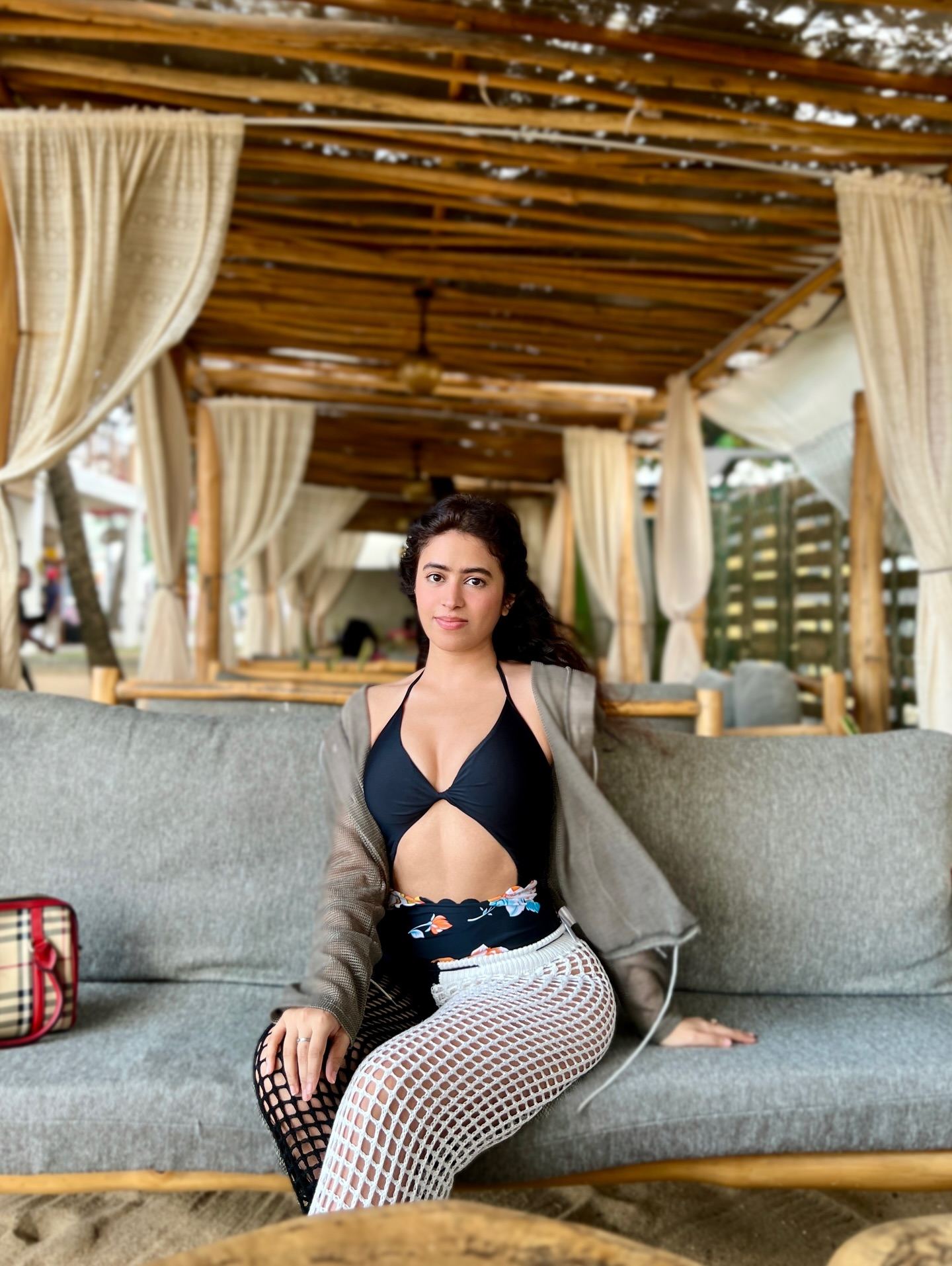 Shobhita Rana In Black Bikini With Relaxed Smile