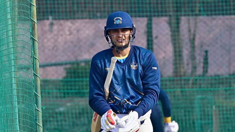 Shubman Gill walks back during VHT match