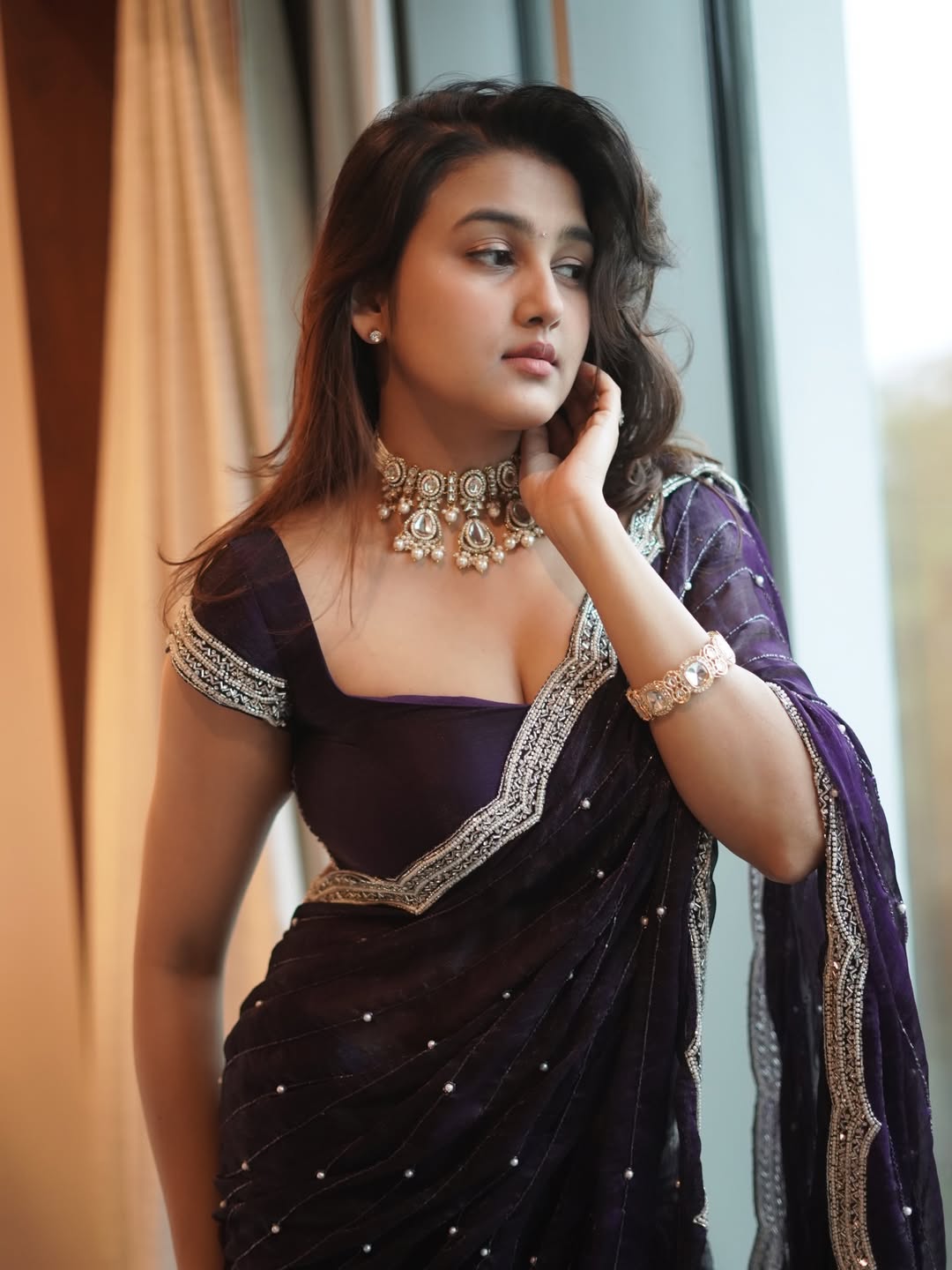 Stunning Sowmika Pandian In A Deep Purple Drape.