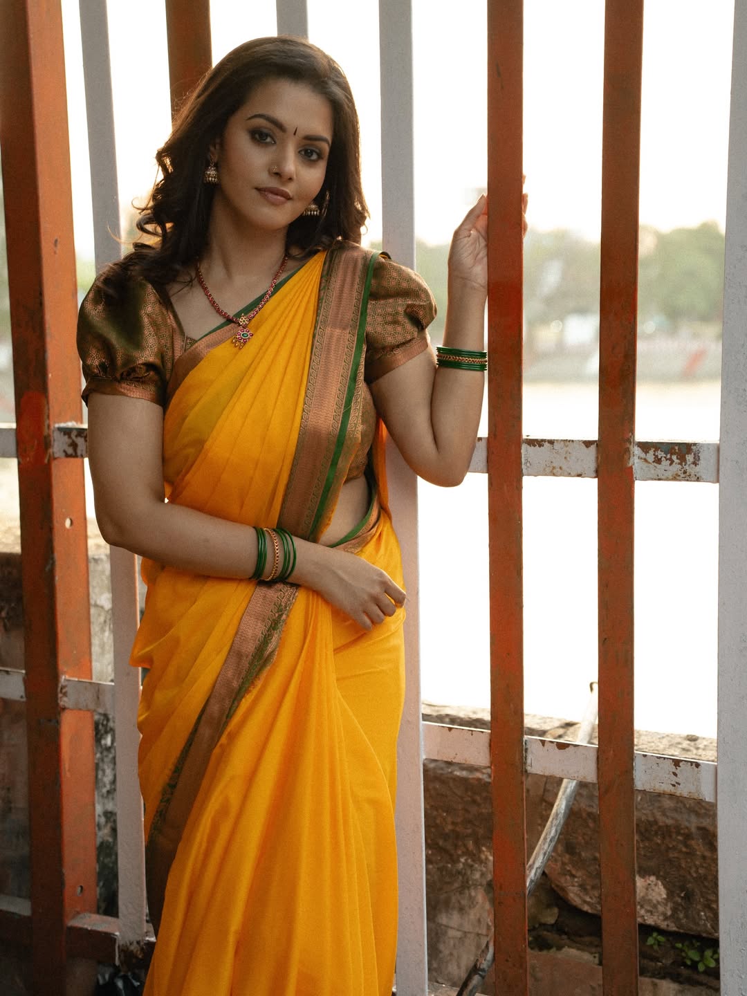 Swathishta Krishnan Leaning On Old Wooden Door