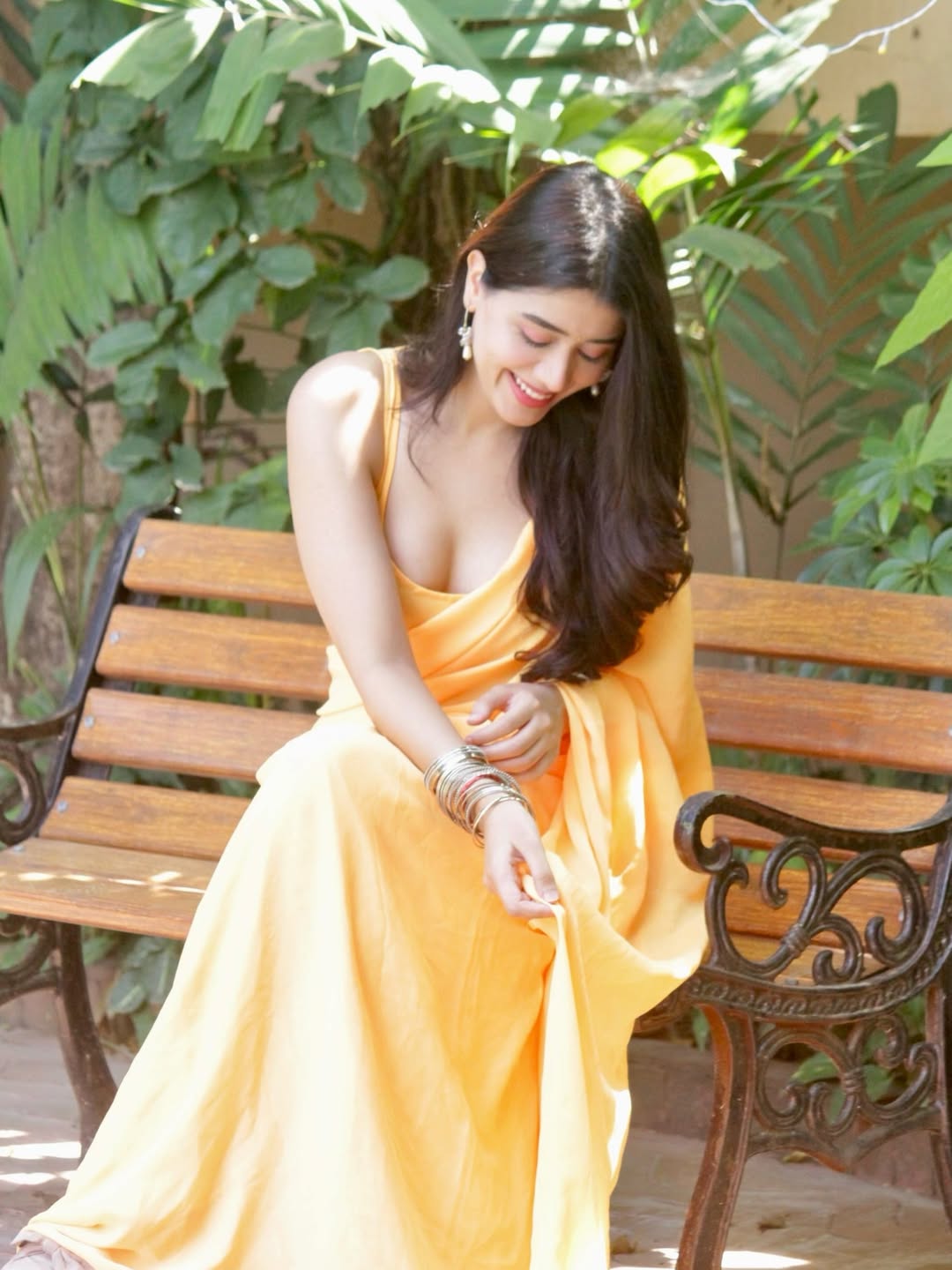 Aarti Chhikara In Yellow Saree On Bench