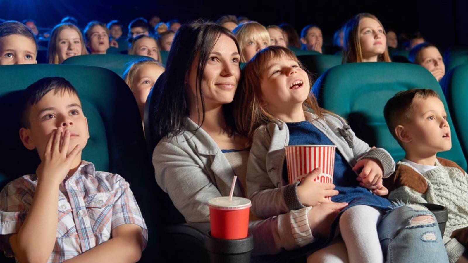 Children watching movie in theatre