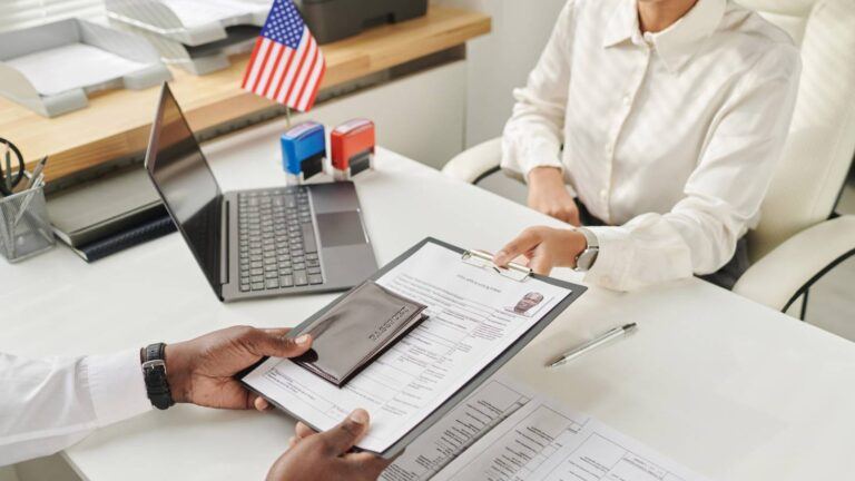 H-1B worker reviewing immigration papers