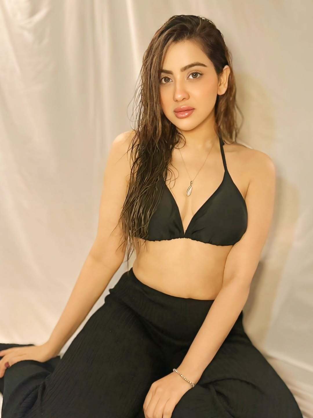 Hritiqa Chheber In Bold Black Halter Bikini Top