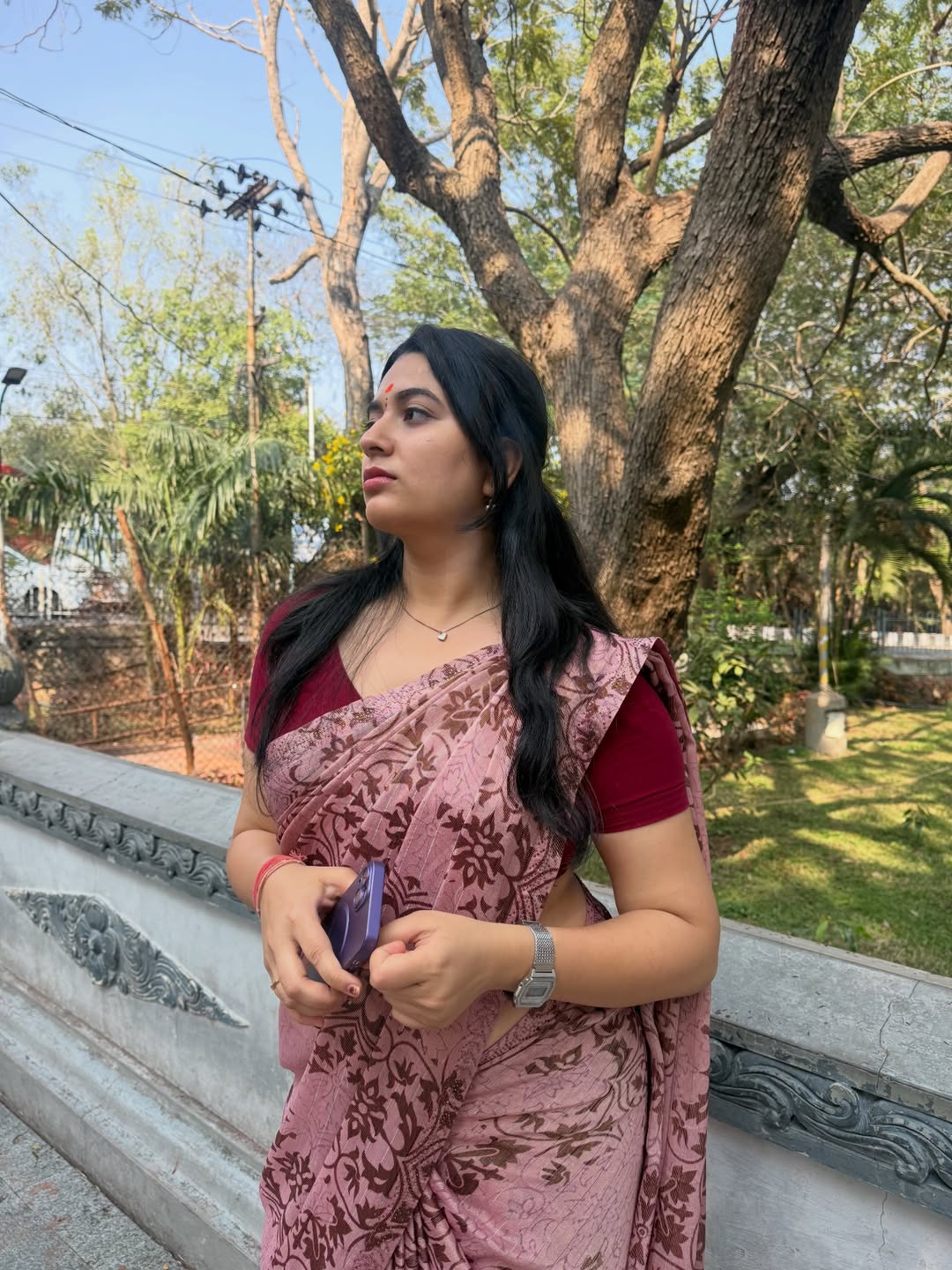 K Sudha Striking A Confident Garden Side Pose