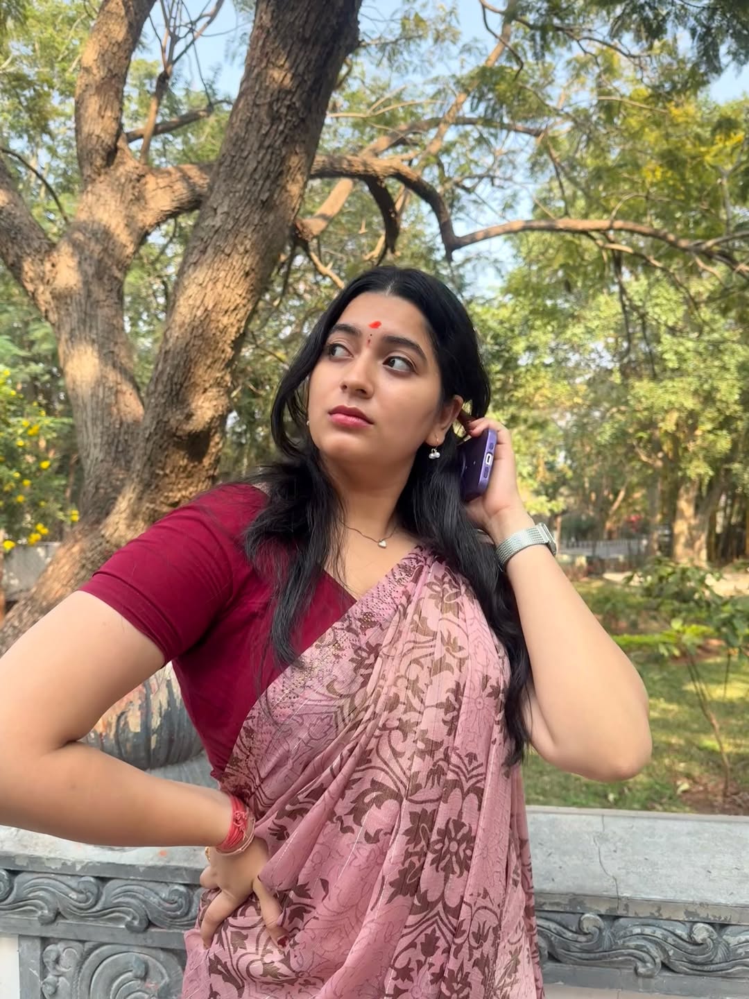 K Sudha Posing Boldly In A Pink Printed Saree