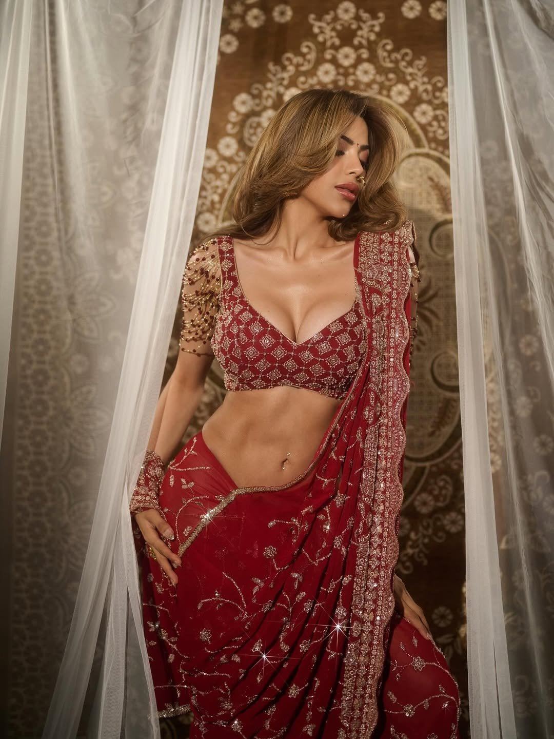 Nikki Tamboli Flaunting Sleek Midriff Fashion