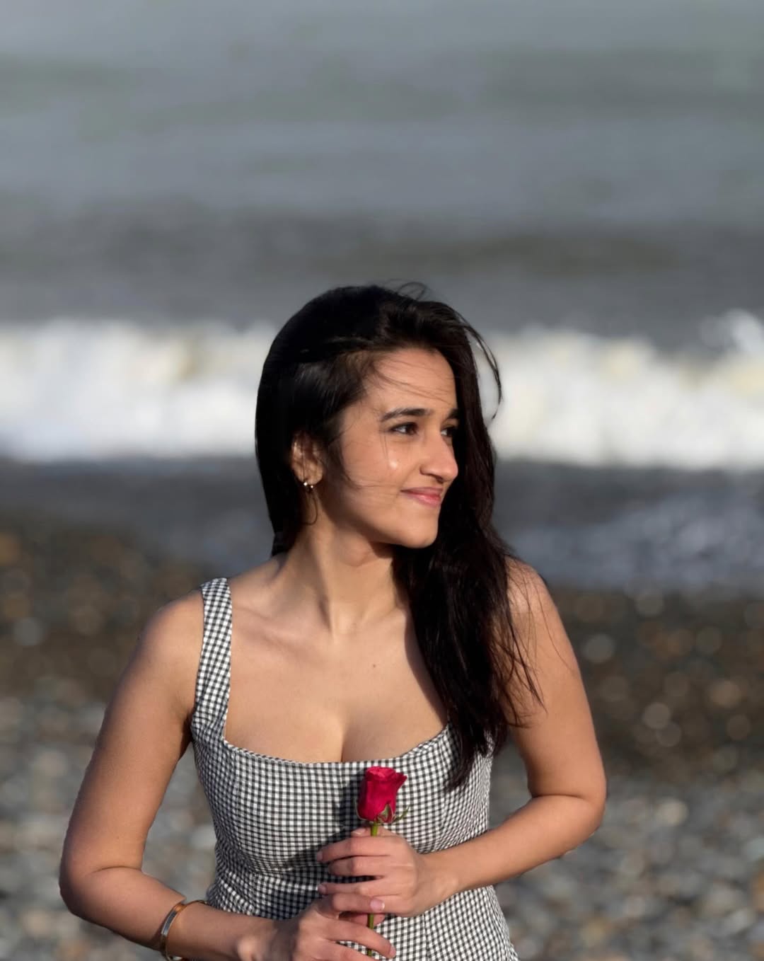Nuveksha Seaside Candid Rose Moment