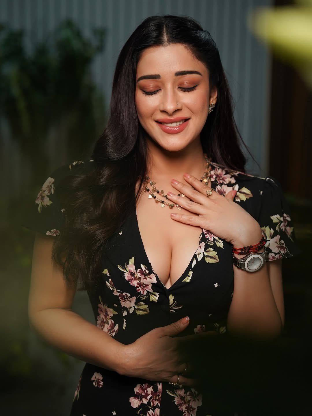 Nyra Banerjee Posing In A Bold Black Floral Gown.