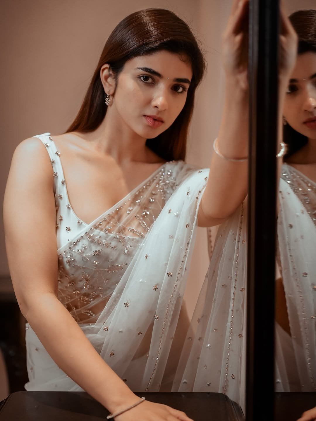 Pragya Nagra Posing In Bold White Sequin Saree.