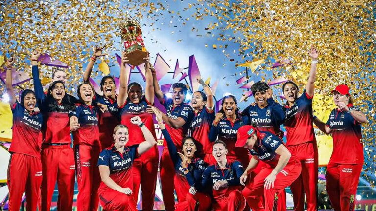 RCB players celebrating hat-trick titles from 2024 to 2026 marking the franchise’s golden era