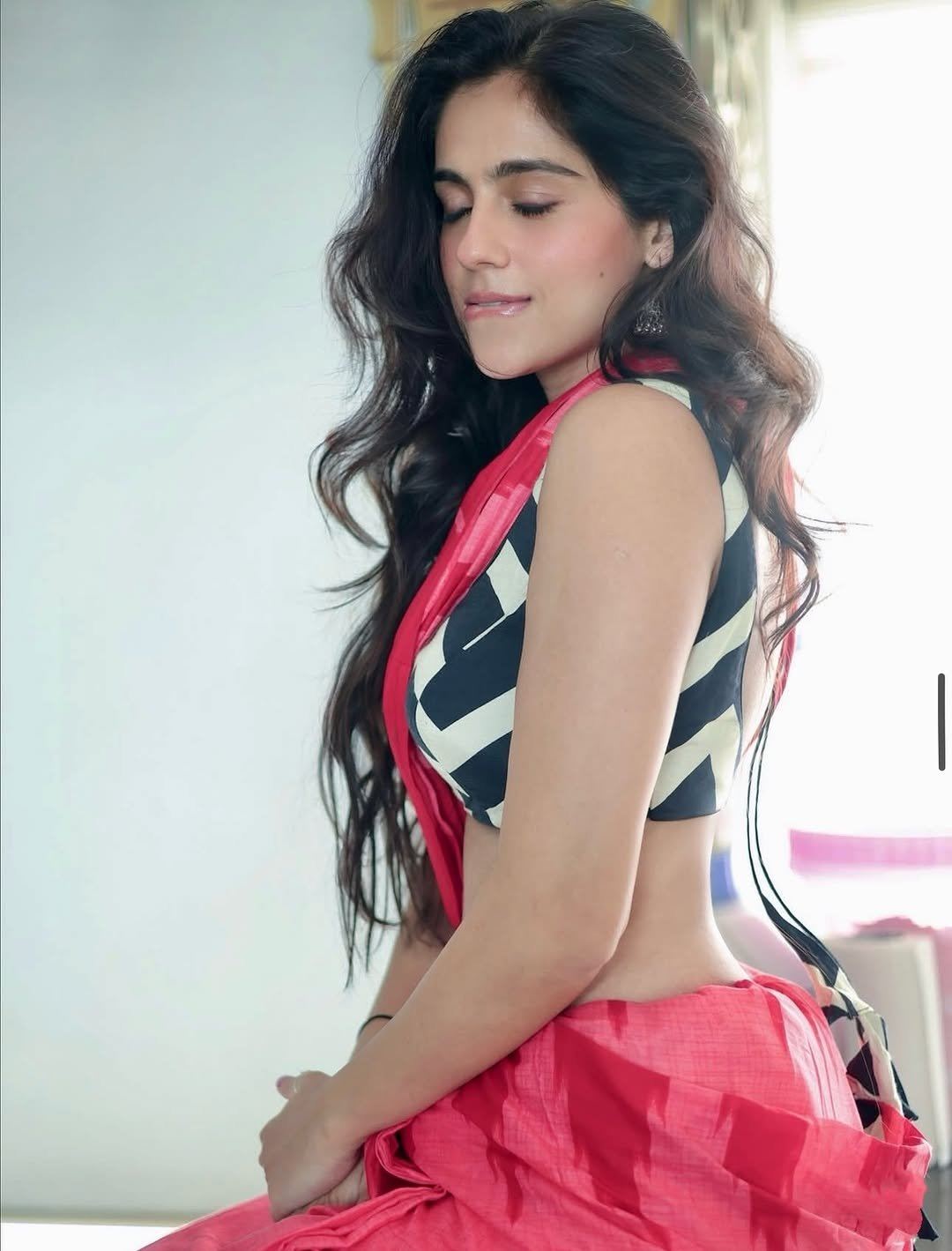 Rose Sardana Posing In Bold Pink Designer Saree