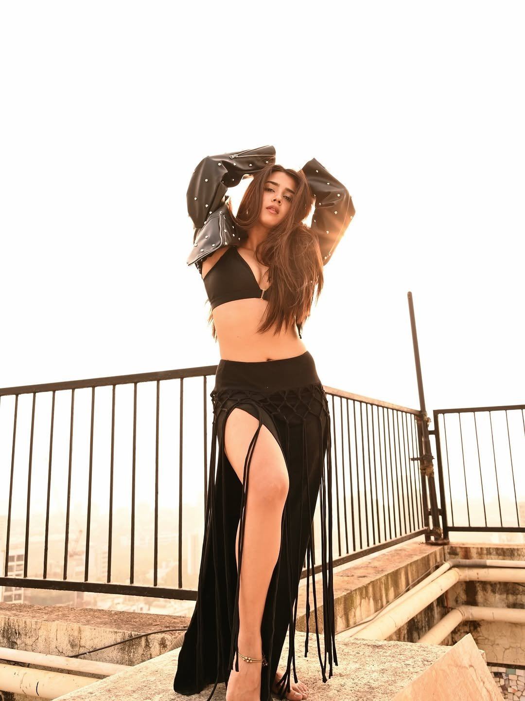 Roshni Walia Posing In A Bold Biker Jacket Look.