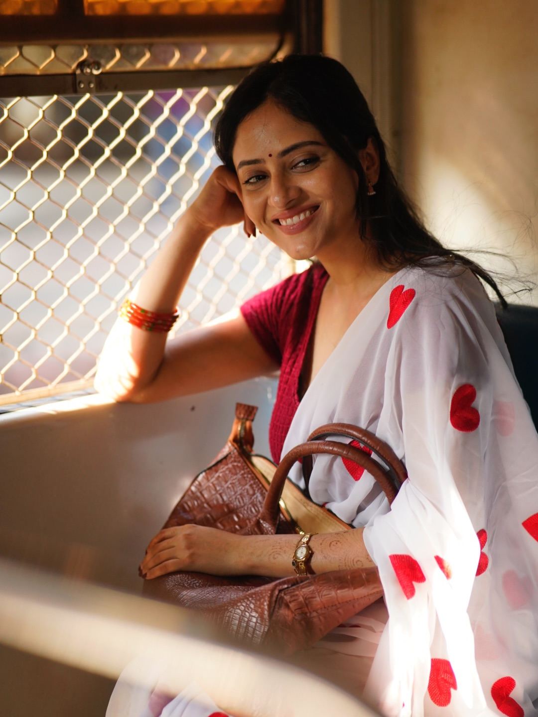 Sanya Thakurrr Intense Gaze In White Heart Saree