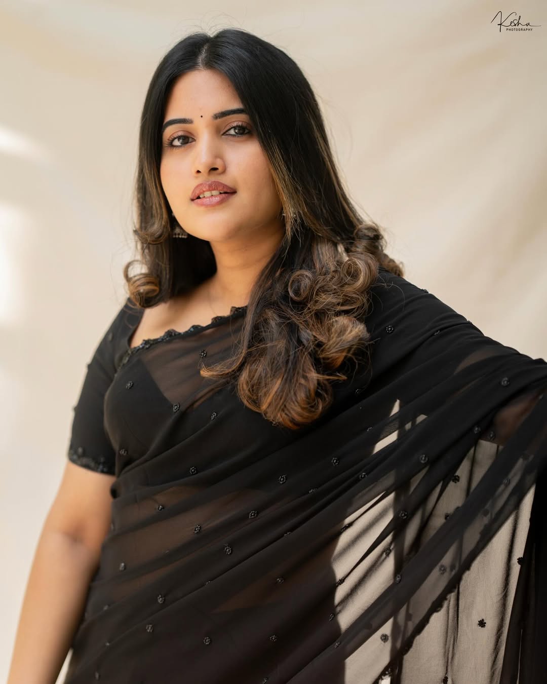 Sravanthi Chokavarapu Posing In Bold Black Saree.