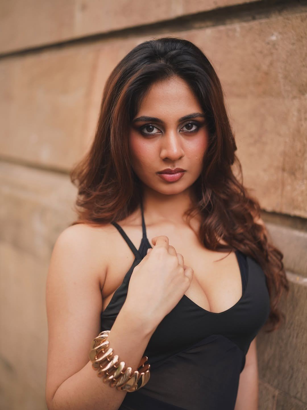 Srushti Bannatti In Bold Maroon Halter Neck Top.