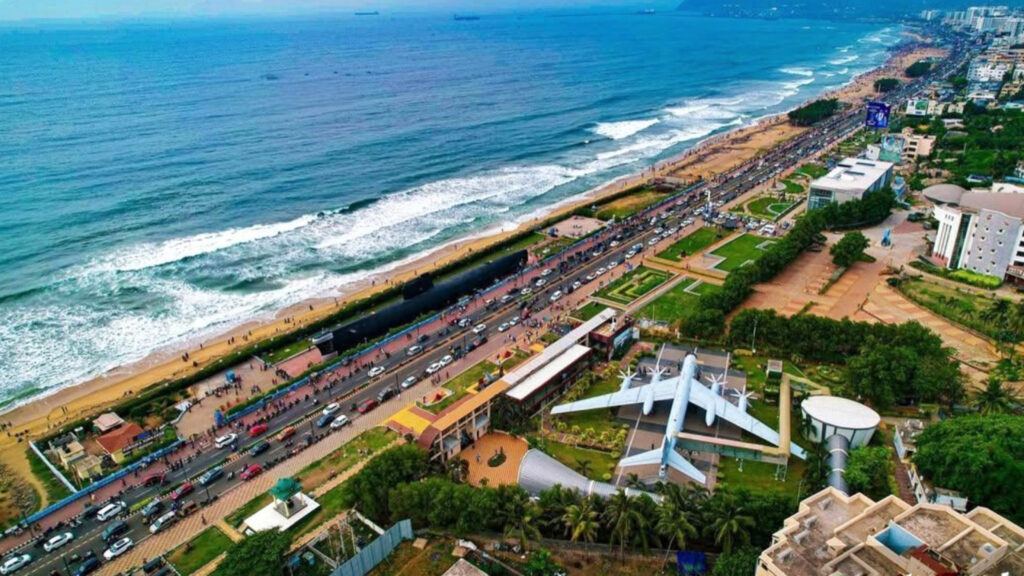 Traffic congestion in Visakhapatnam highlighting delayed flyovers and metro planning amid airport and IT expansion.