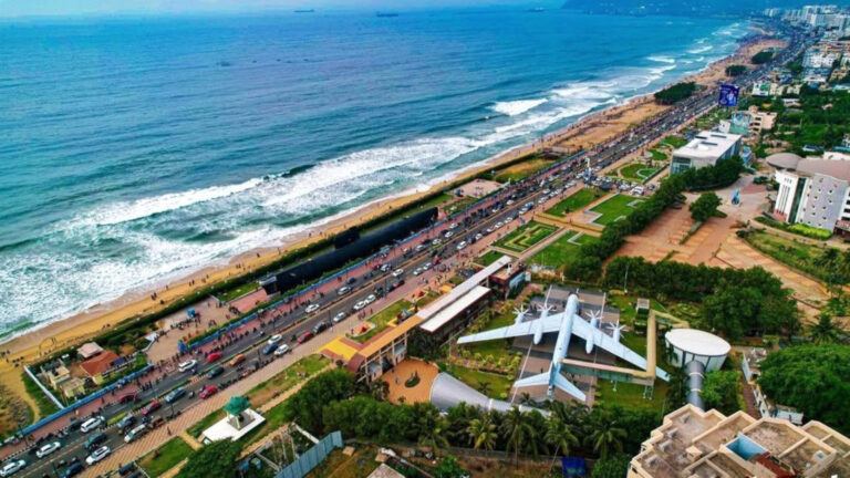 Traffic congestion in Visakhapatnam highlighting delayed flyovers and metro planning amid airport and IT expansion.