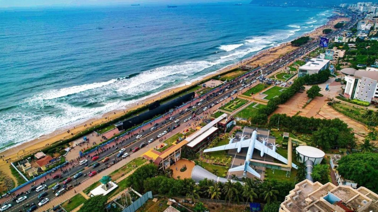 Traffic congestion in Visakhapatnam highlighting delayed flyovers and metro planning amid airport and IT expansion.