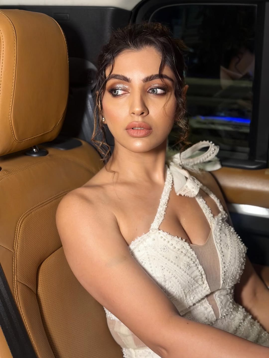 Akanksha Puri Exudes Confidence In Car Photoshoot