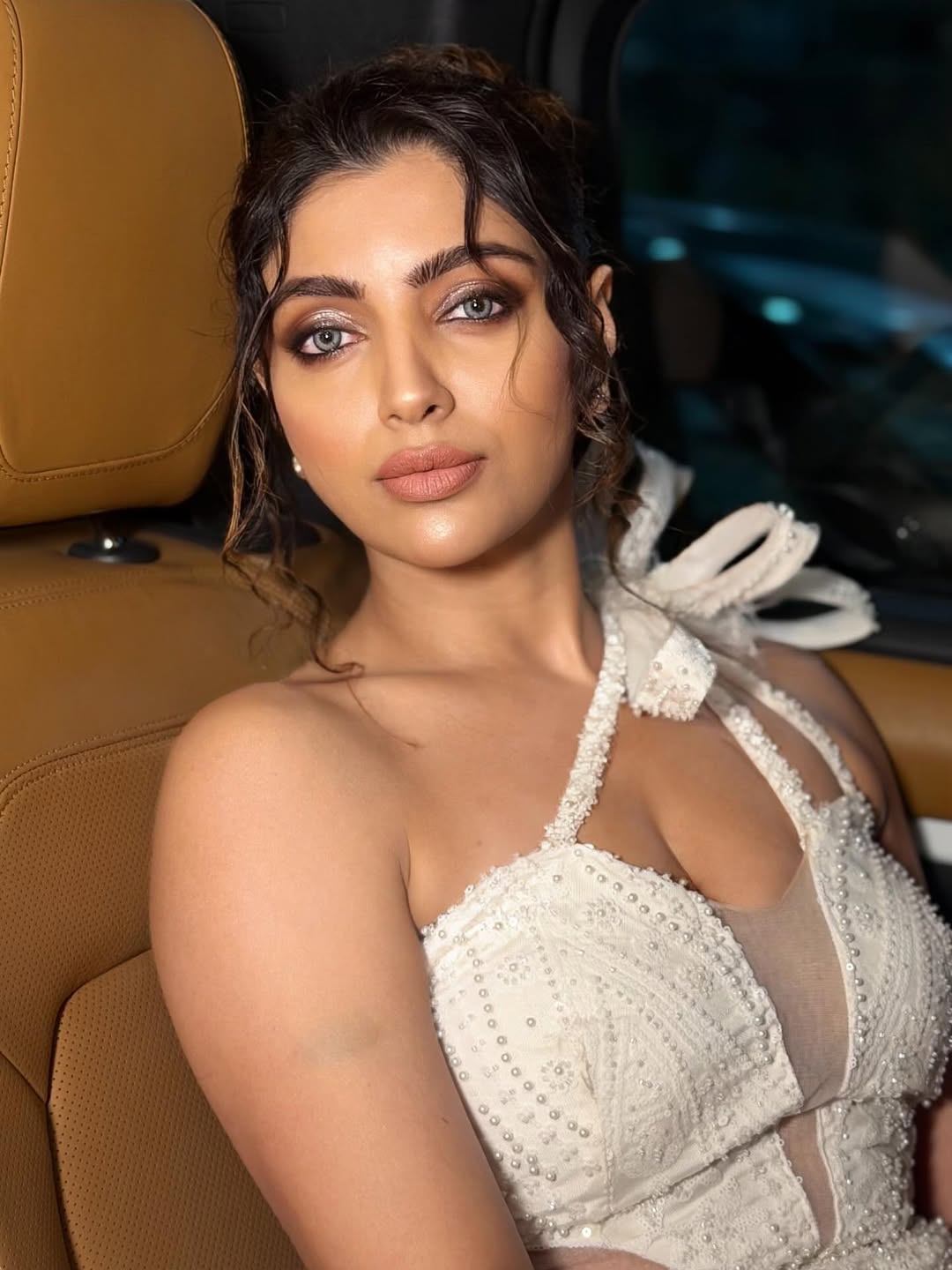 Akanksha Puri Rocks Messy Bun With White Ribbon