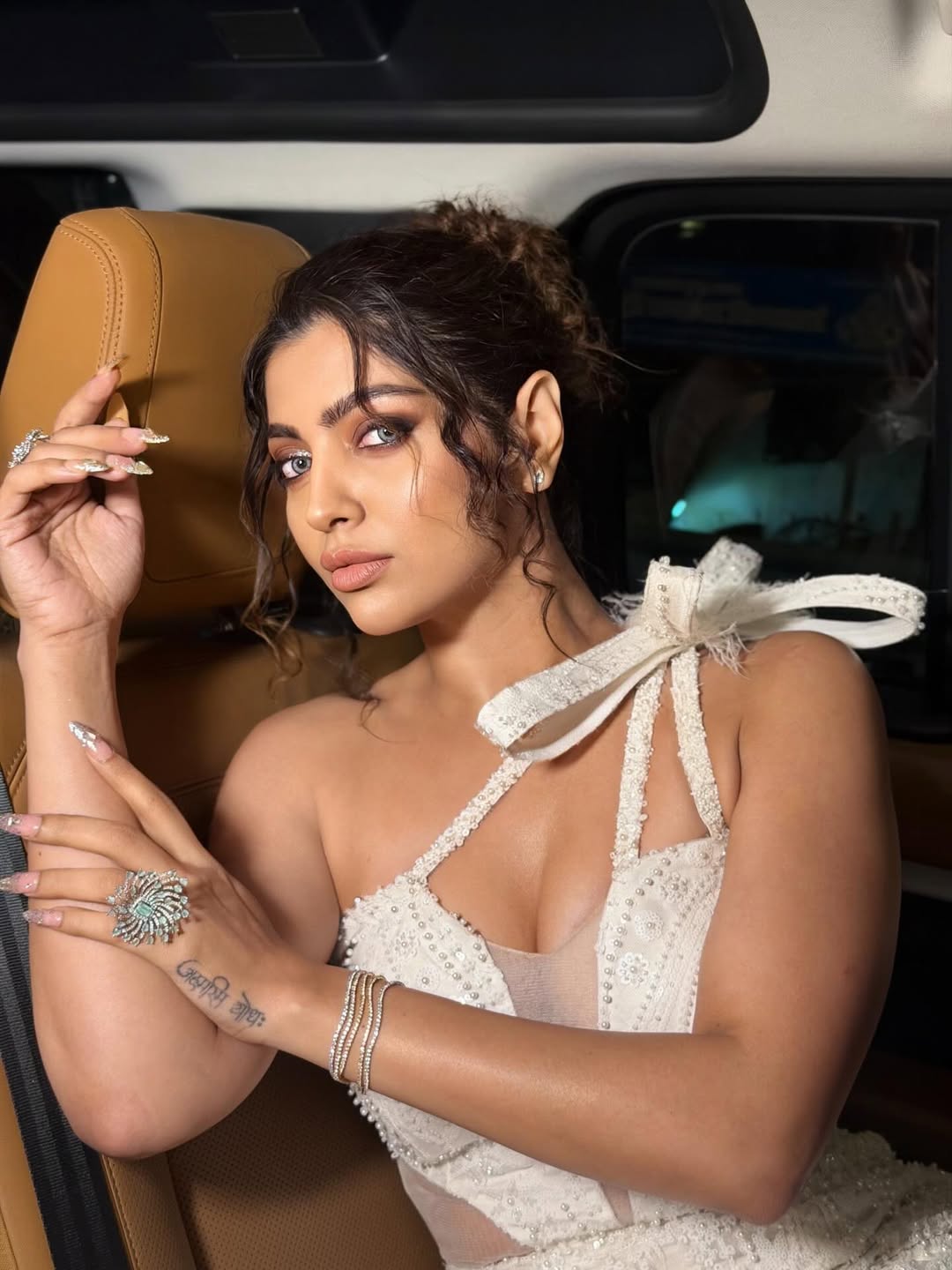 Akanksha Puri Poses In Ornate White Pearl Corset