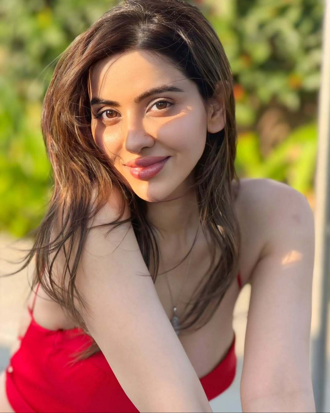 Hritiqa Chheber Sun Kissed Glow In Red Fashion