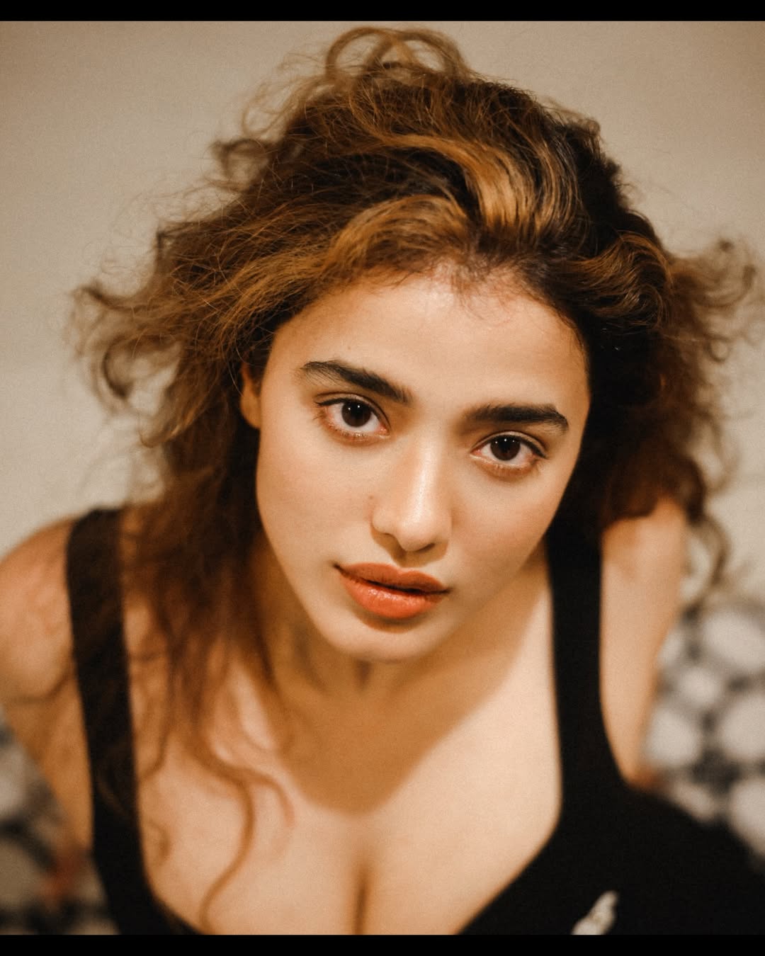 Ketika Sharma Poses In A Bold Black Strap Top