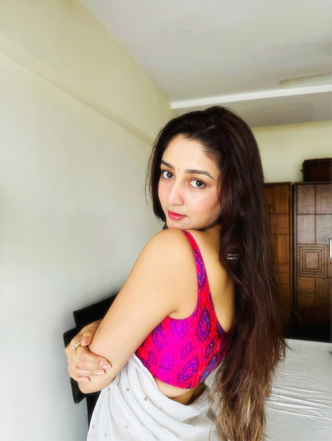 Kuhoo Paranjape Posing Boldly In Pink Ikat Blouse