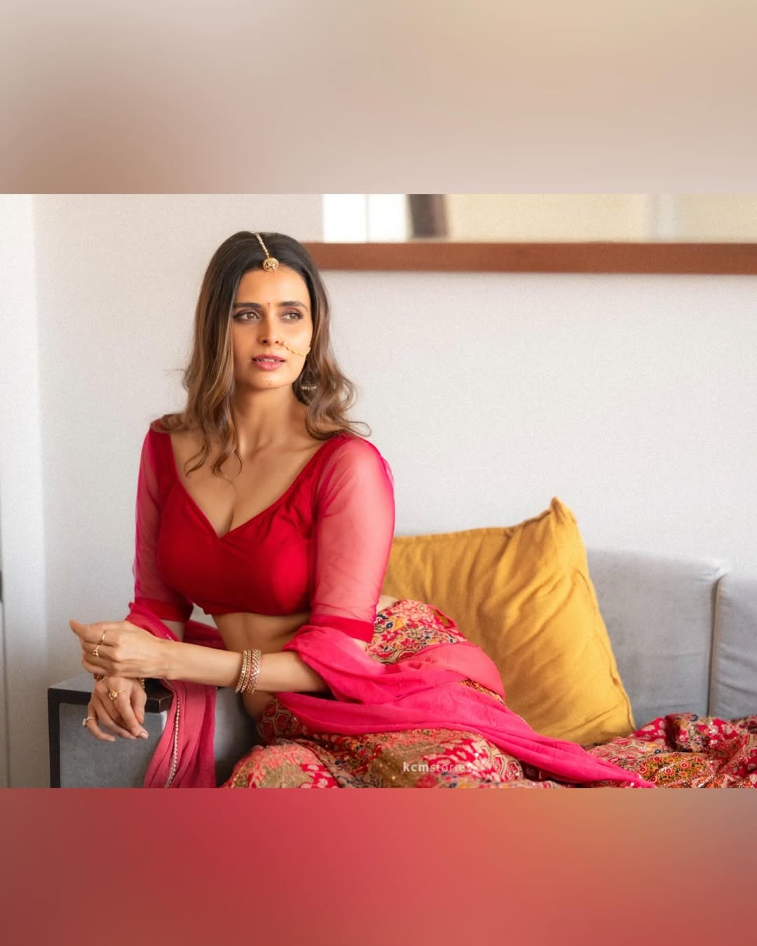 Stylish Meenakshi Dixit Looking Out Of A Window