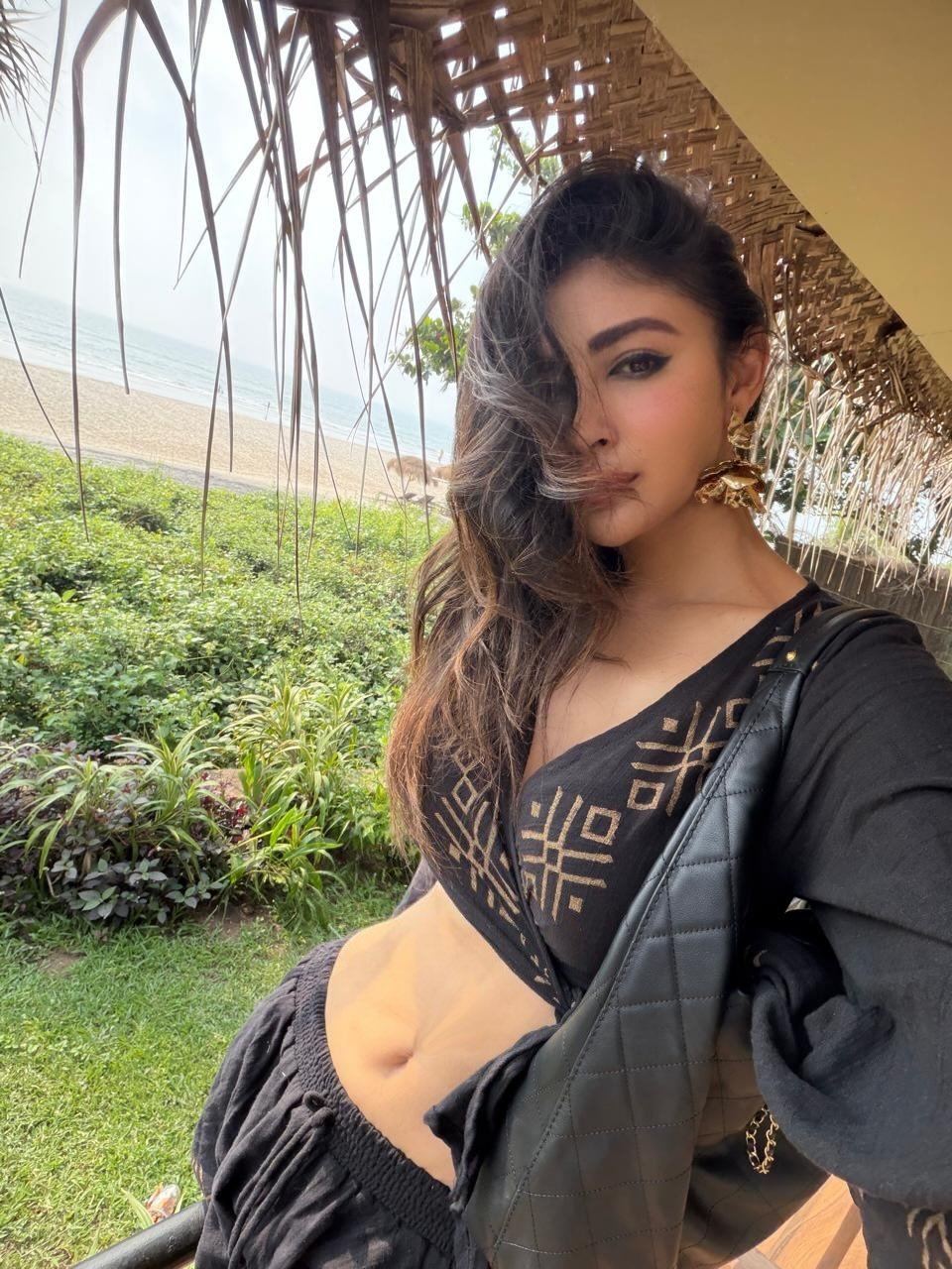 Mouni Roy beachside selfie in stylish black dress