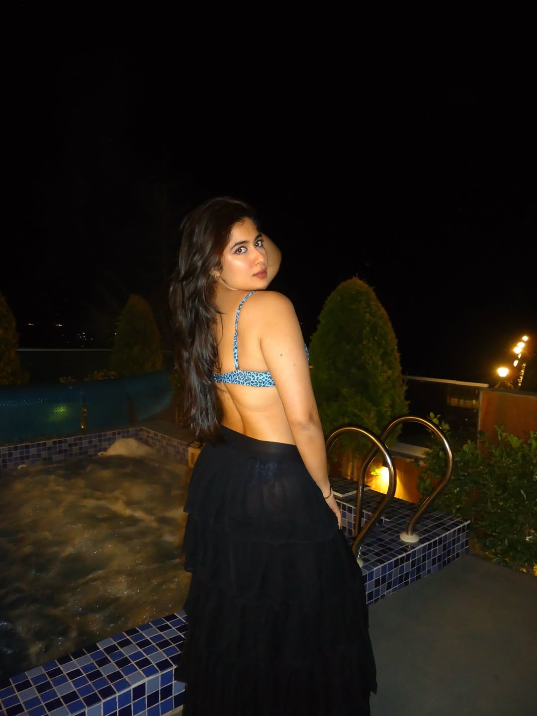Stylish Nikita Sharma Leaning Near Pool Ladder