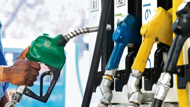 Petrol pump displaying increased fuel prices amid global oil crisis and US Iran war impact