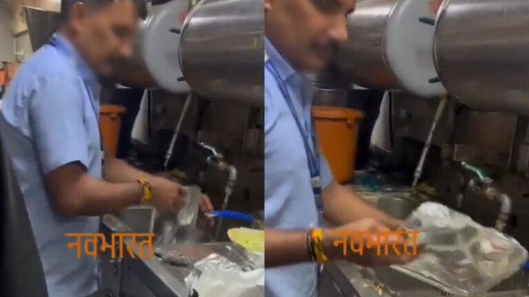 Railway pantry staff washing utensils