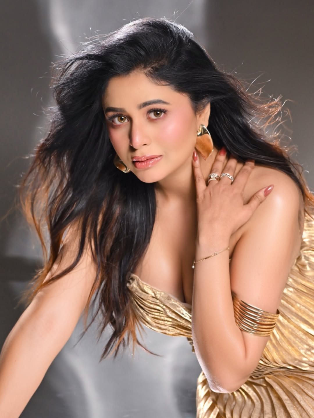 Ritabhari Chakraborty Bold Pose In Metallic Gown
