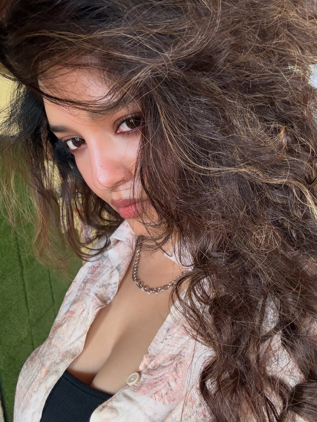 Ritika Singh Fierce Gaze In Messy Curls Look