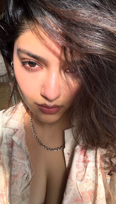 Ritika Singh Unbuttoned Shirt And Black Bralette