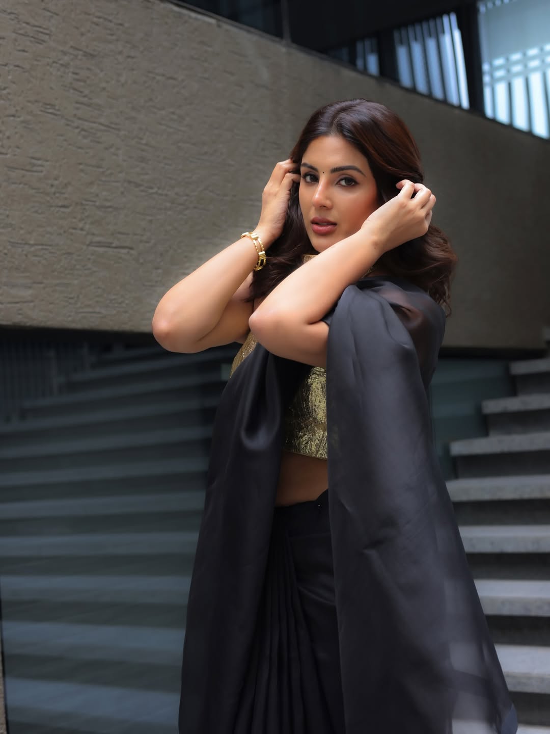Samyuktha Menon In Bold Black Sheer Saree Pose