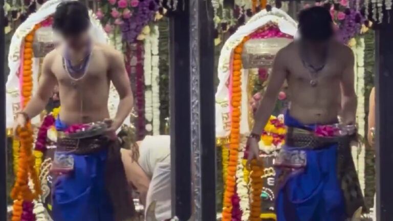 Priest performing ritual inside temple