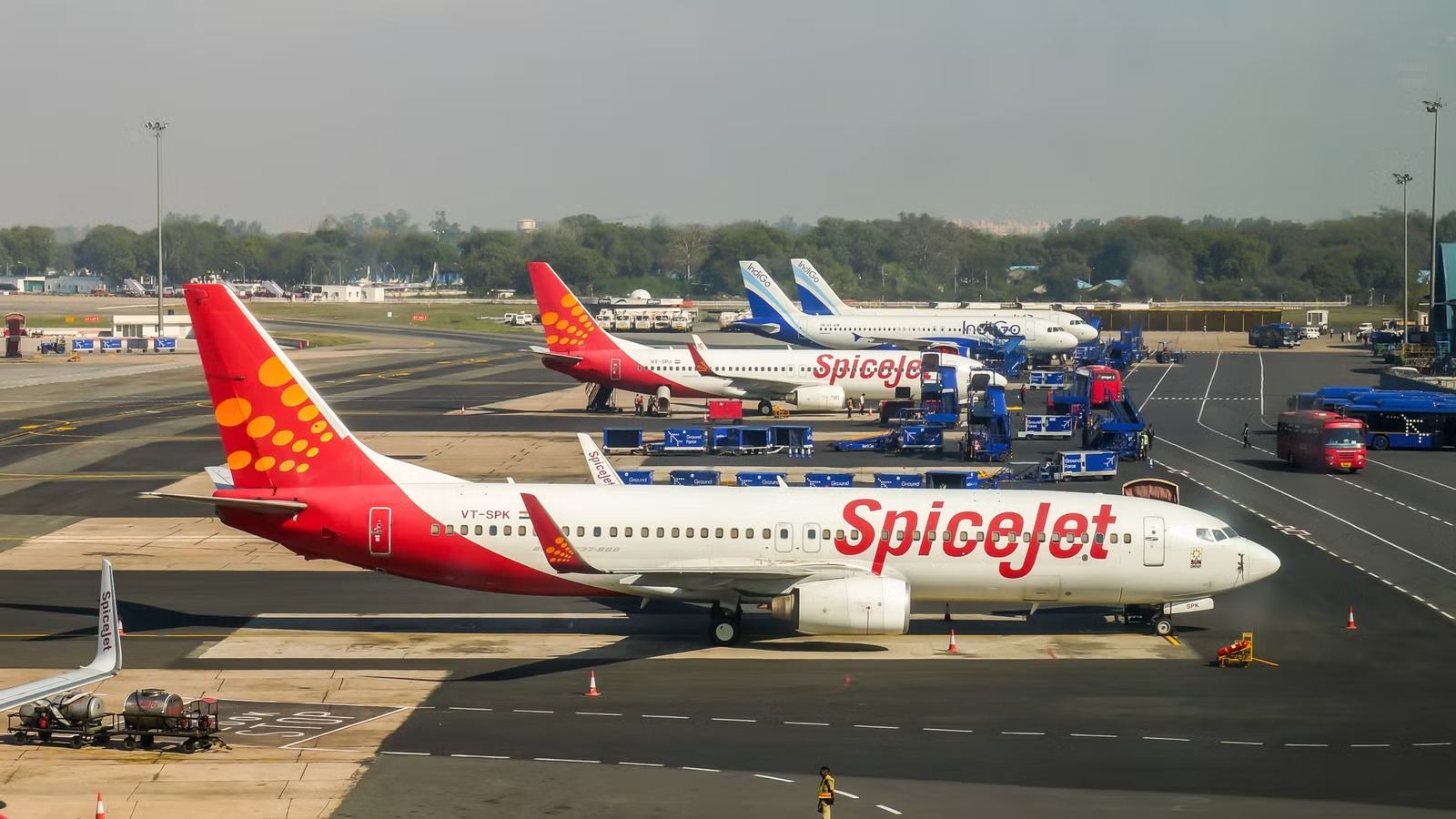 Airport runway with aircraft parked