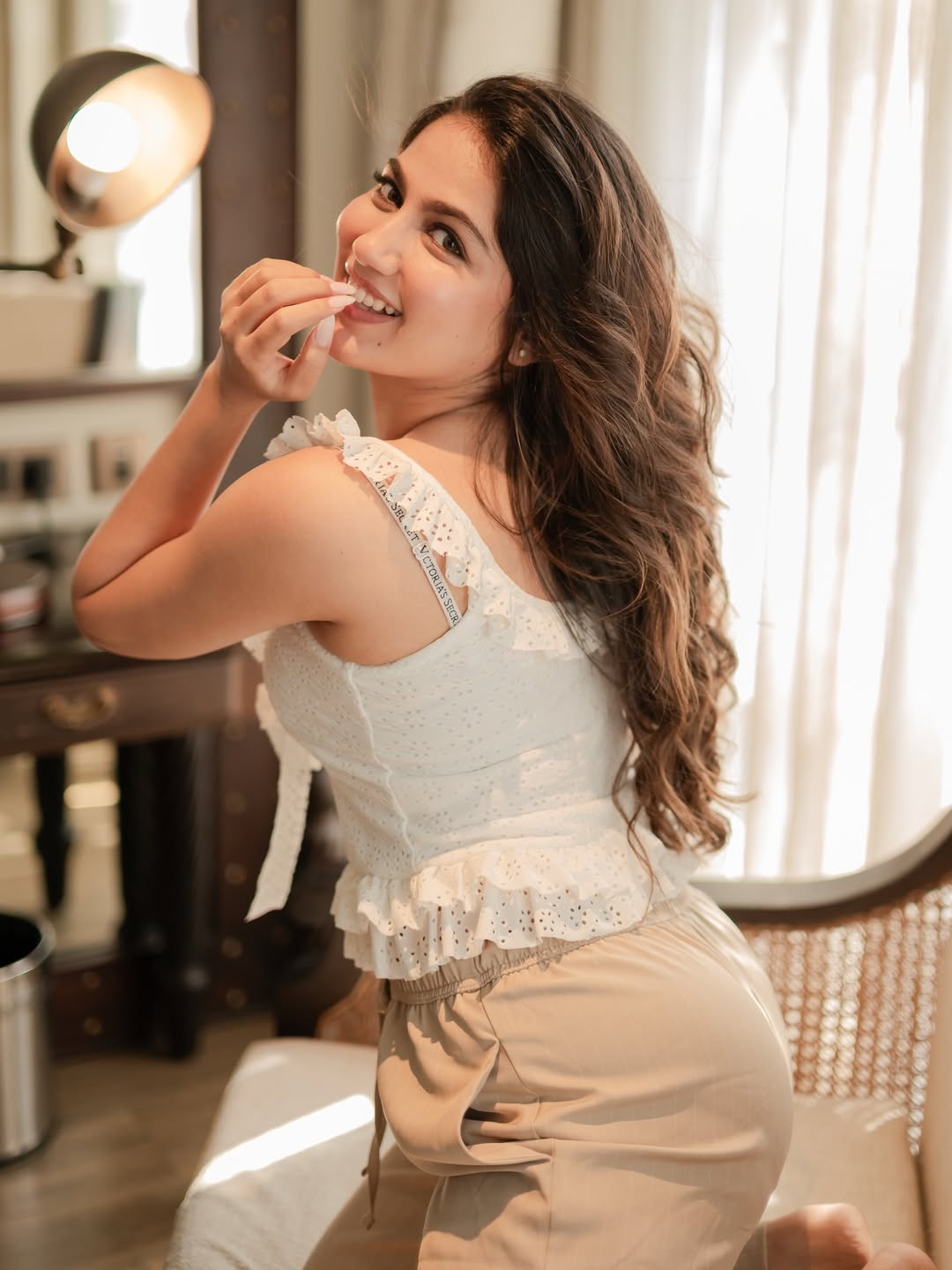 Bhuvaneshwari Vishwanath Poses In White Ruffled Top