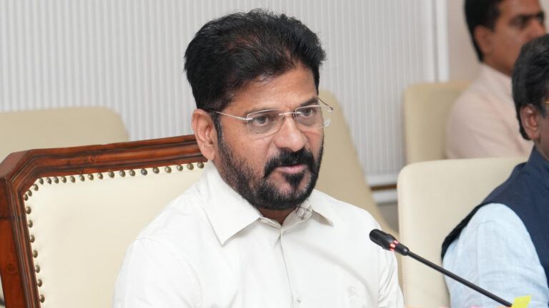 Revanth Reddy criticizing BRS and KCR during party anniversary event