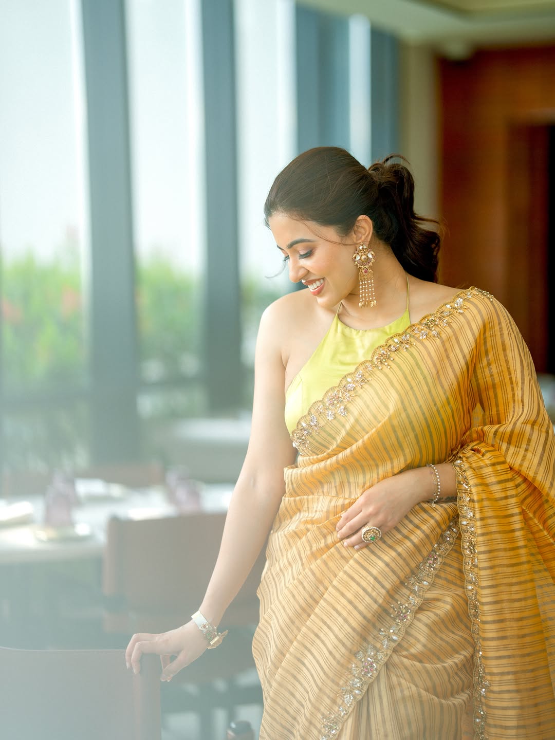 Anju Kurian Posing Elegantly In Sunlit Interior